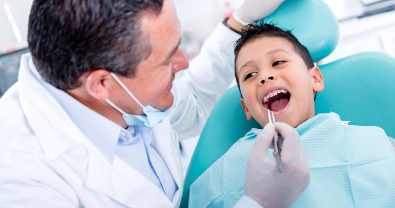 dentist treat child